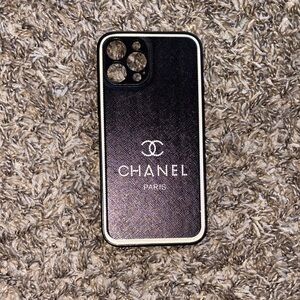 CHANEL Elegant Black and Gold Phone Case